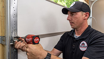 Access Garage Door technician replacing garage door