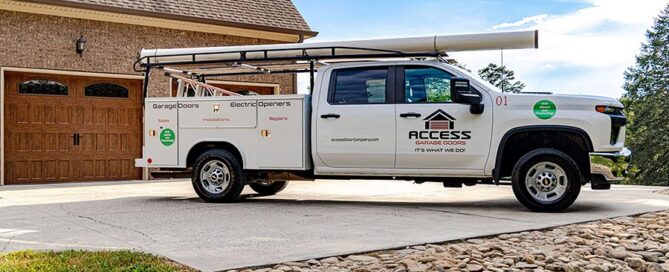 Access Garage Doors truck outside a residential home