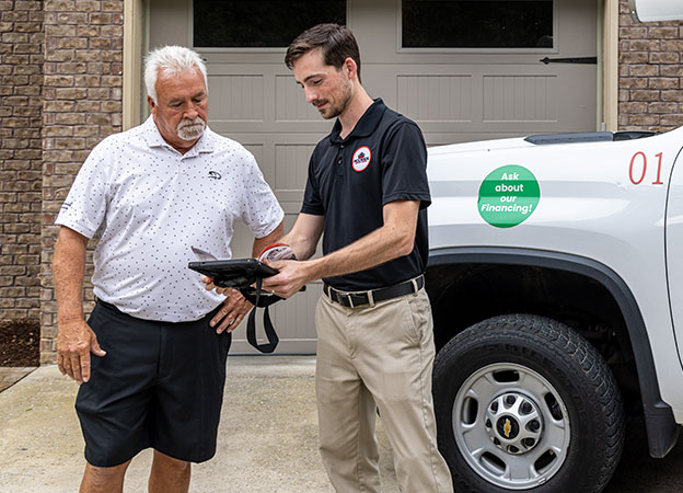 installer-helping-customer Access Garage Doors installer helping a customer