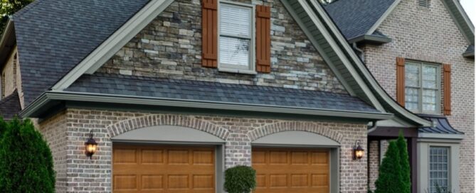 Home with a wood garage door
