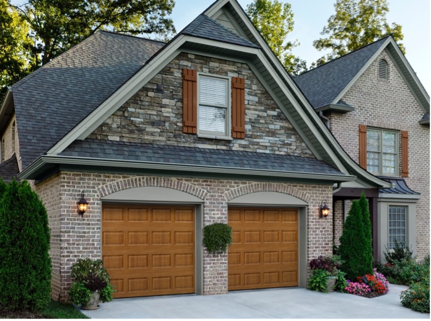 Home with a wood garage door
