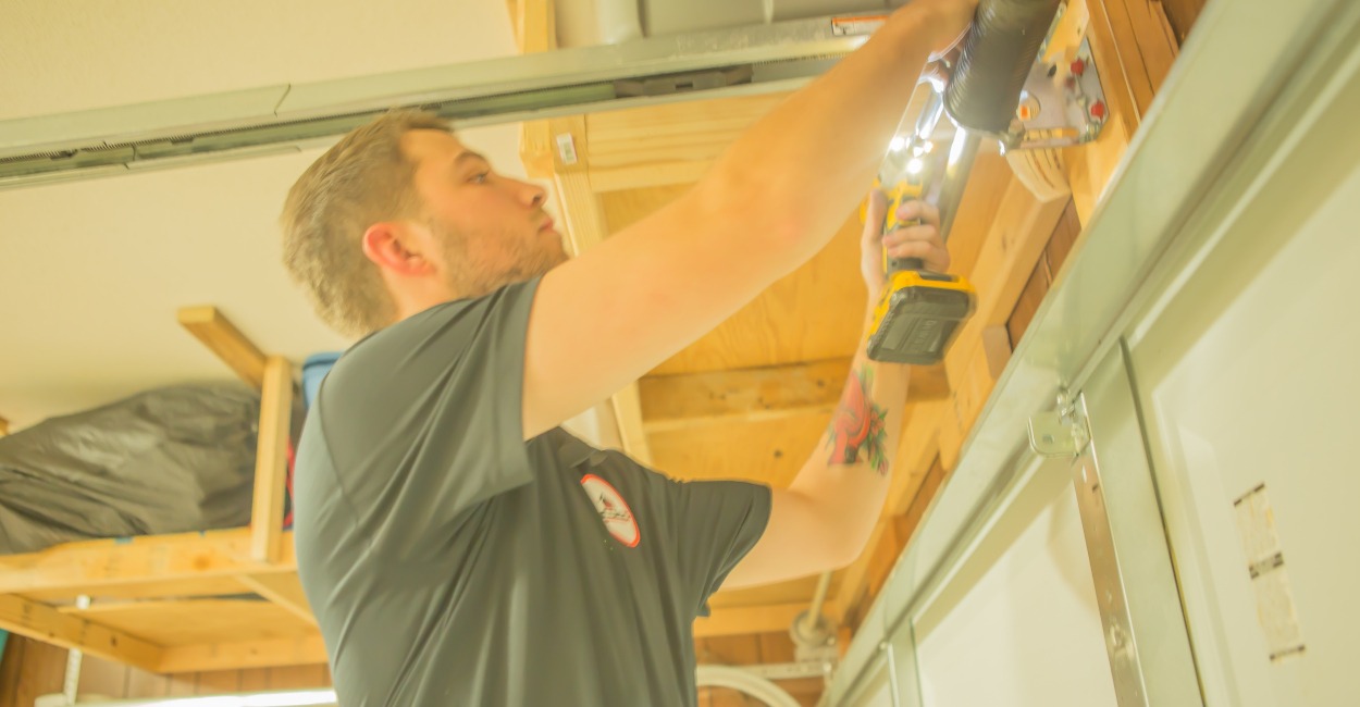 Garage Door Spring Repair: Should I Repair or Replace?