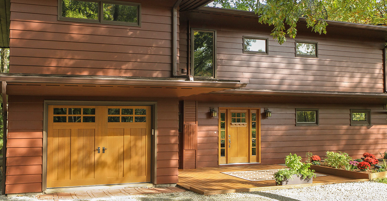 Garage Door Installation Tips for Wood or Dark Colored Home