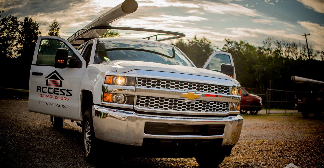 Regular Garage Door Service Can Extend the Life of Your Garage Door System